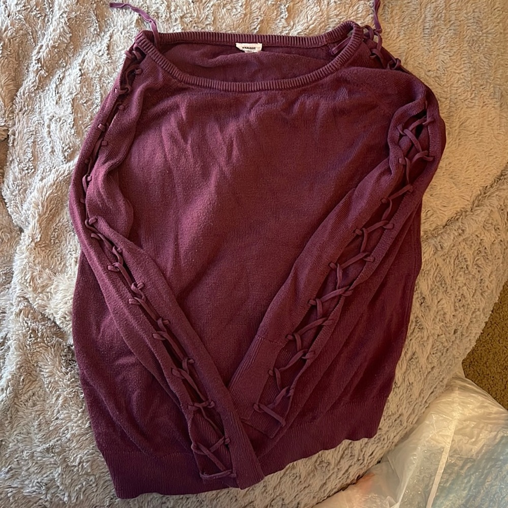 Super soft, maroon color, perfect condition, holes down the arms sleeves,